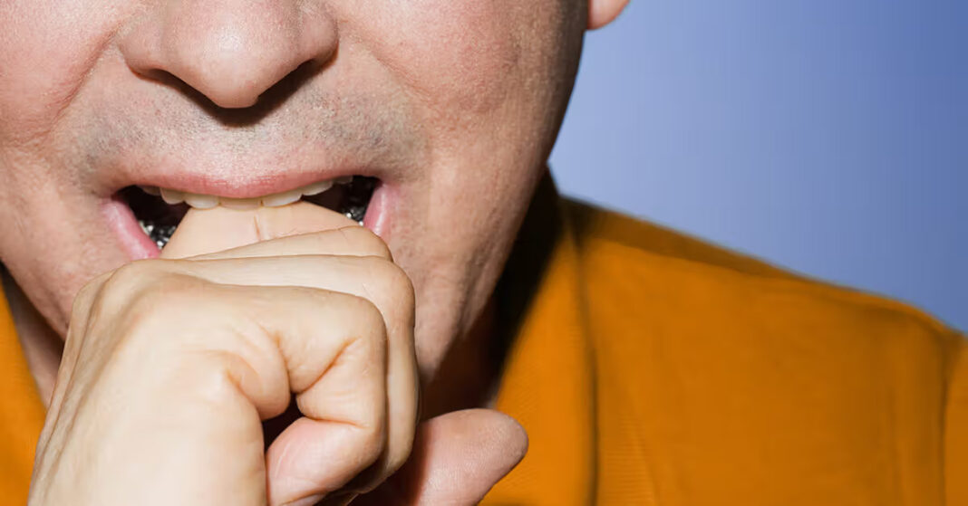 close-up-man-biting-knuckle-finger-1200x628-facebook-1200x628